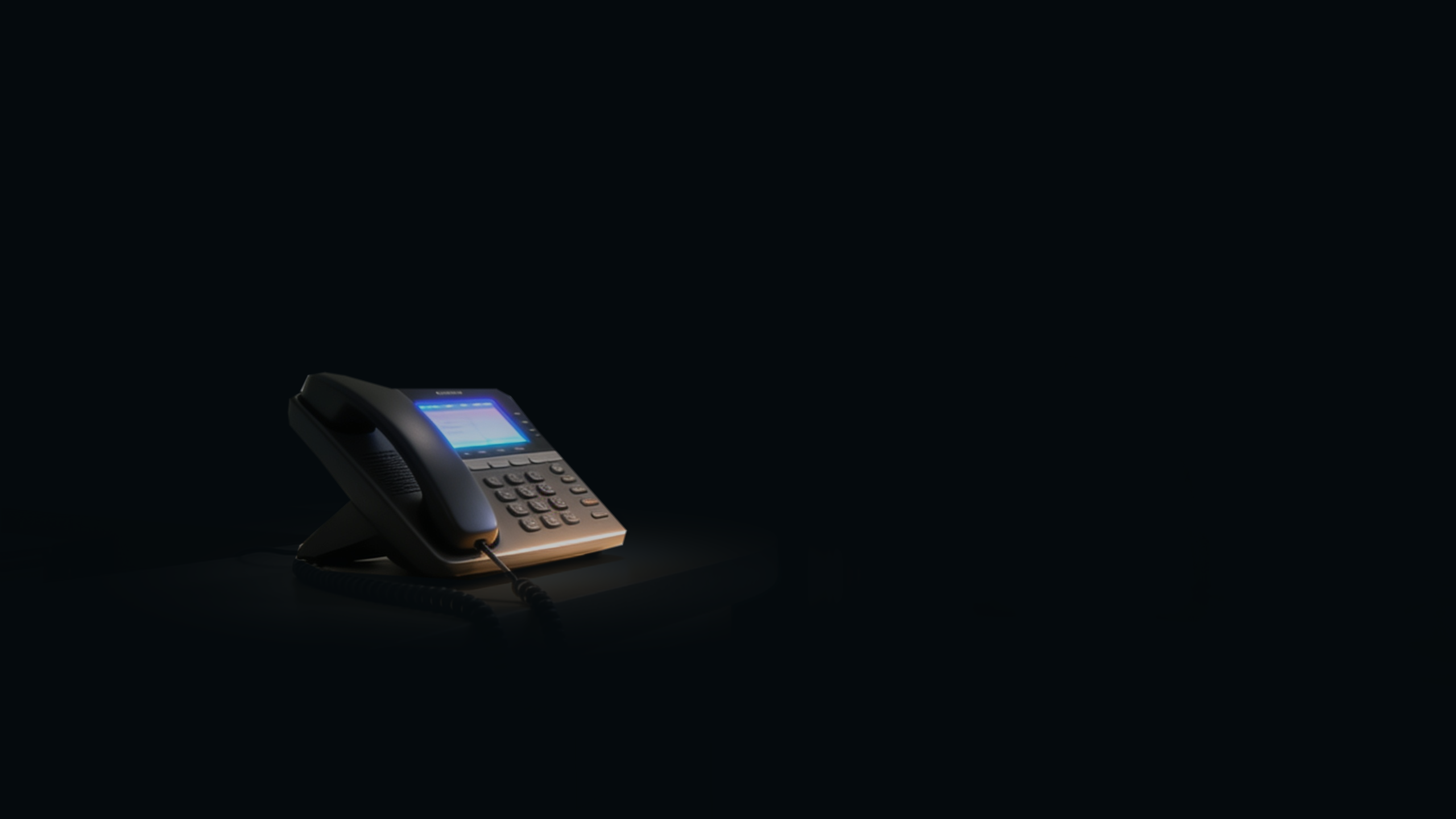 Telefon na ladzie w ciemnej recepcji.